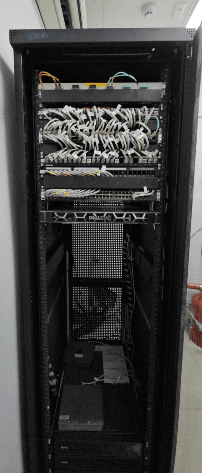 Completed network cabinet after revamp with improved cable management