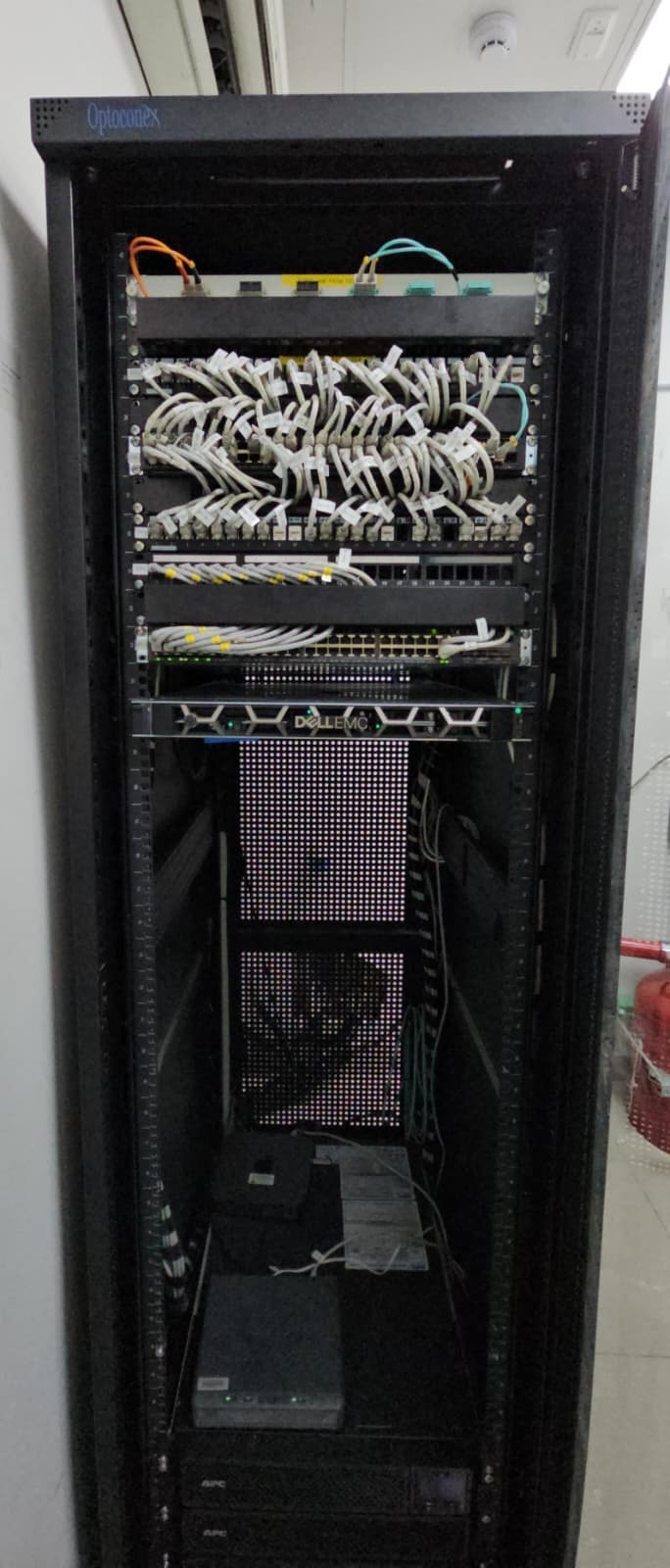 Completed network cabinet after revamp with improved cable management