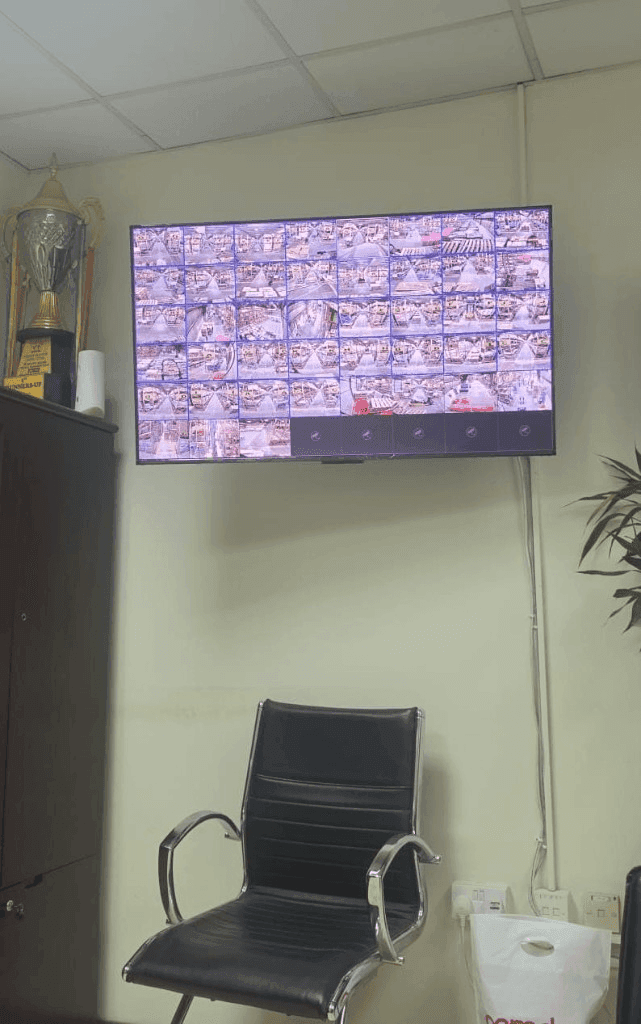 CCTV monitoring wall with multi-camera grid display for warehouse security in Kuwait